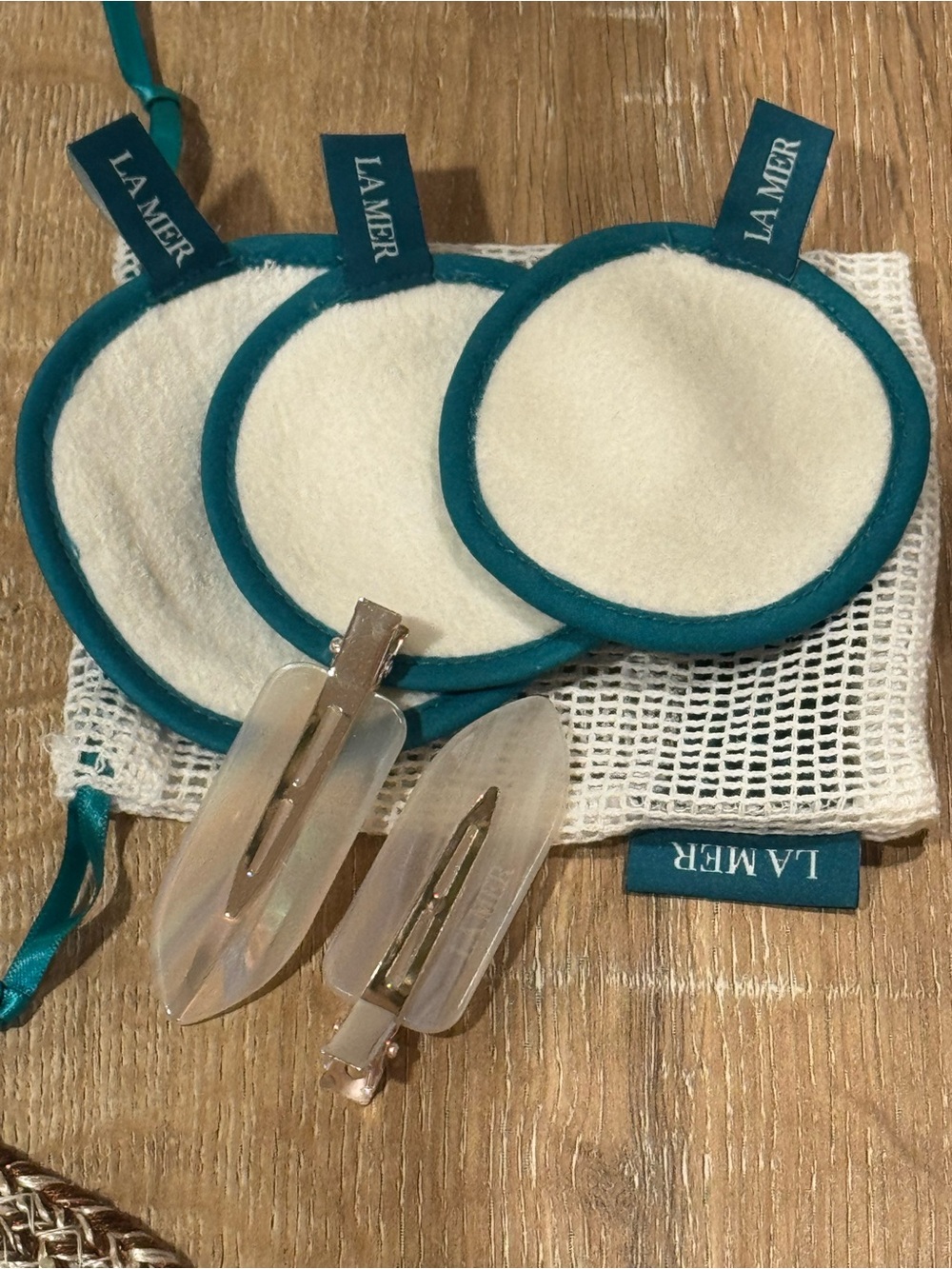 La Mer Cream Rounds with Teal Trim and Opalescent Clips